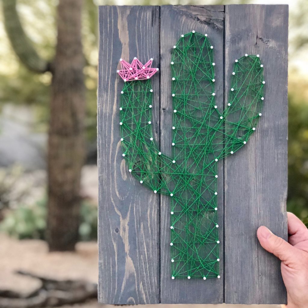 Cactus string art on wooden plaque