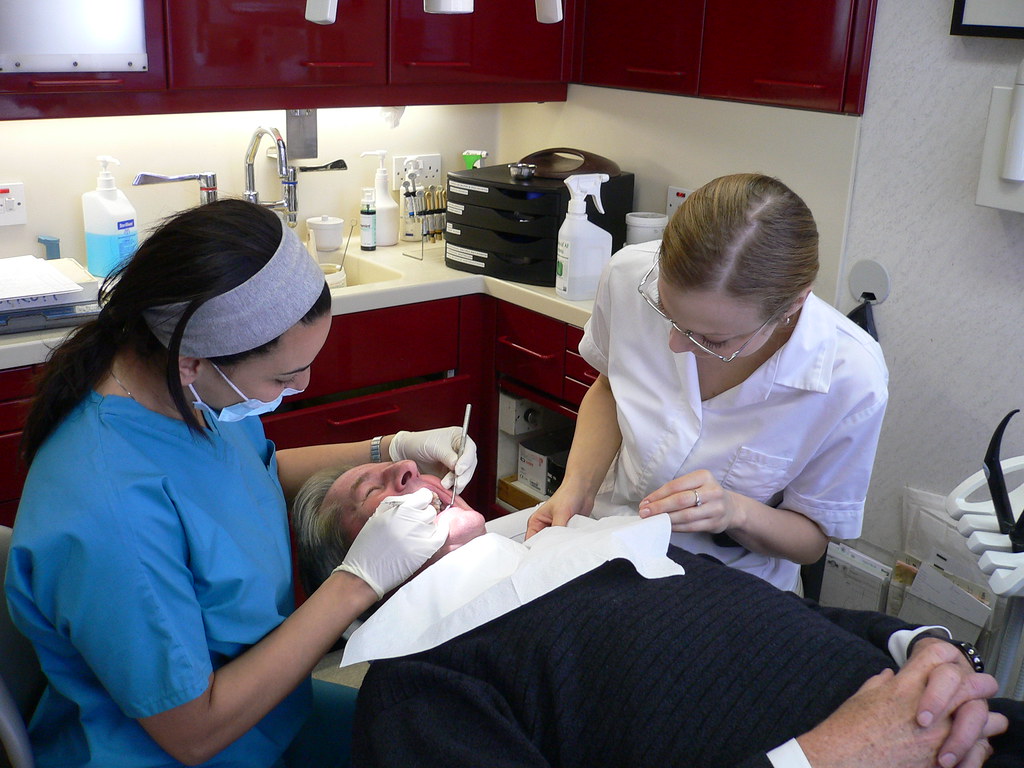 dentist working in a patient
