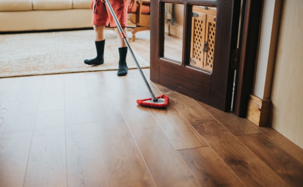 Children brushing a wooden floor. - Latest Fashion & Lifestyle Trends
